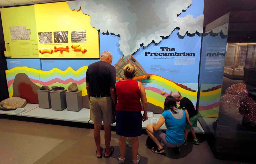 The Manitoba Museum. Some people look at the Precambrian exhibit that shows how the land was formed in Manitoba. BORIS MINKEVICH/WINNIPEG FREE PRESS