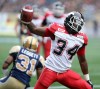 TREVOR HAGAN / WINNIPEG FREE PRESS
Calgary Stampeders' Tory Harrison (34) celebrates after scoring a touchdown against the Winnipeg Blue Bombers' during first half CFL football action Saturday in Winnipeg.