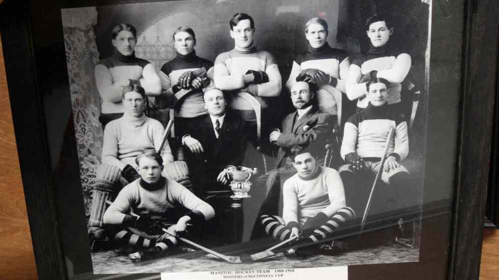 JOE BRYKSA / WINNIPEG FREE PRESS A photo of a team from 1909/10 that hangs inside the Manitou Community Arena.