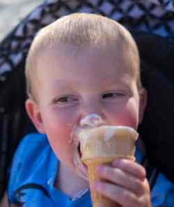 Gleason Hildebrand cools down with some ice cream.