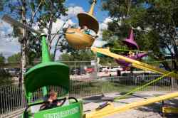 Children go for a ride on the "helicopter."