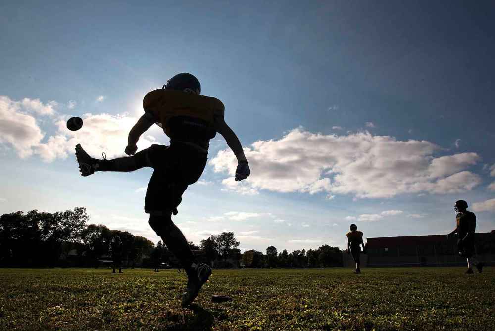 Kicker Hameid Sofizada of the Miles Mac Buckeyes practices on school grounds in East Kildonan at the end of August in 2016.