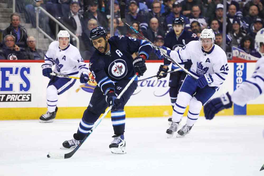 MIKE DEAL / WINNIPEG FREE PRESS
Winnipeg Jets' Dustin Byfuglien (33) handles the puck during the game against the Toronto Maple Leafs at the MTS Centre Wednesday evening.