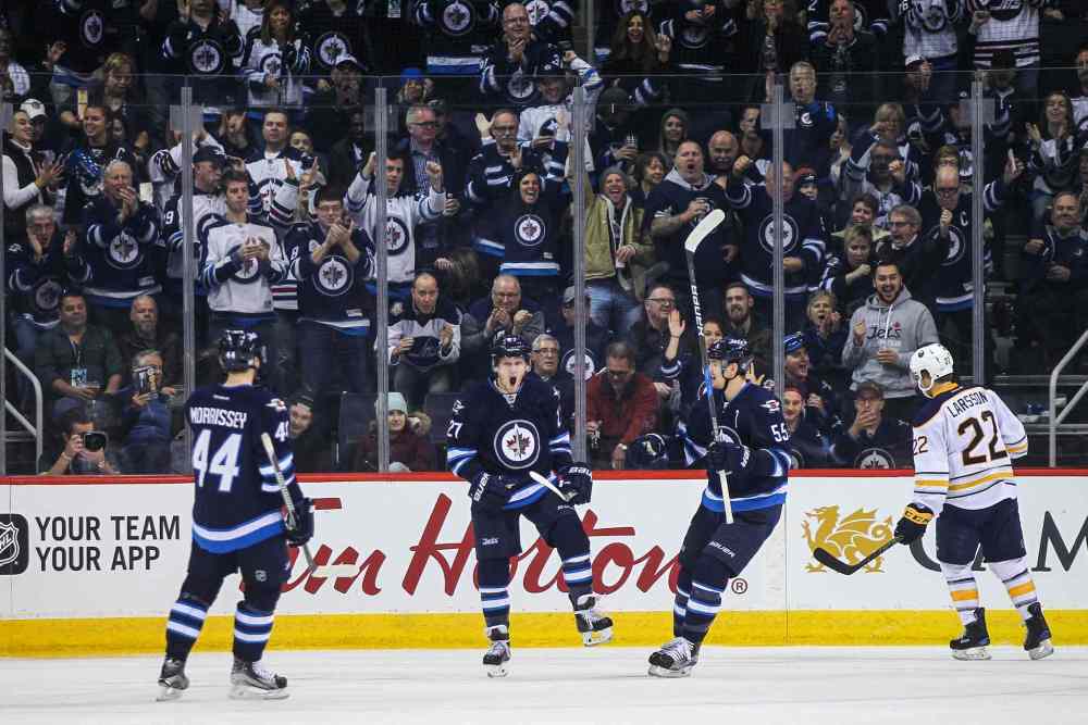 MIKE DEAL / WINNIPEG FREE PRESS
Winnipeg Jets' Nikolaj Ehlers (27) celebrates his goal against the Buffalo Sabres during NHL game action Sunday afternoon at the MTS Centre.