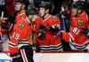 Nam Y. Huh / The Associated Press
Chicago Blackhawks' Jonathan Toews (19) celebrates with teammates after scoring a goal during the first period.