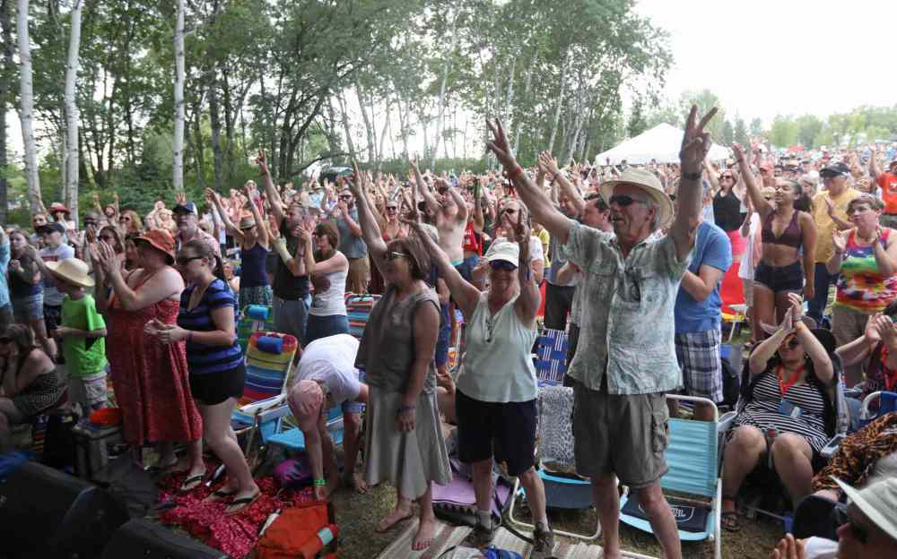 RUTH BONNEVILLE / WINNIPEG FREE PRESS
Wesli performs on stage as thousands gather to listen and dance at the 44th annual Folk Festival at Birds Hill Park Saturday.