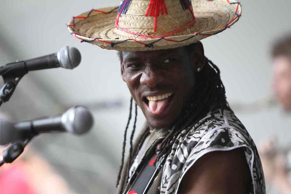 RUTH BONNEVILLE / WINNIPEG FREE PRESS
Wesley Louissaint, lead singer of the band Wesli, performs on stage at the 44th annual Folk Festival at Birds Hill Park Saturday.