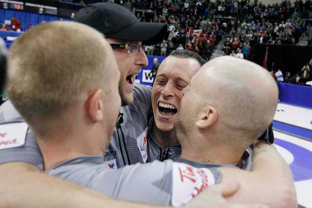 John Woods / The Canadian Press
From left: Brad Jacobs, Ryan Harnden, E.J. Harnden and Ryan Fry celebrate their win.