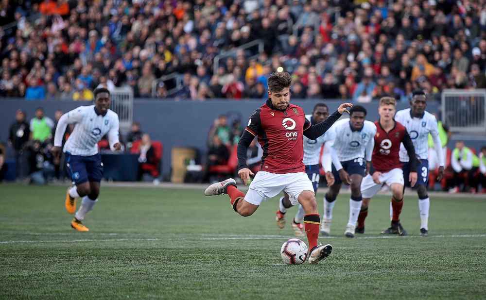 Valour FC's Micheal Petrasso scores the teams first goal at home, on a penalty kick, against FC Edmonton.
