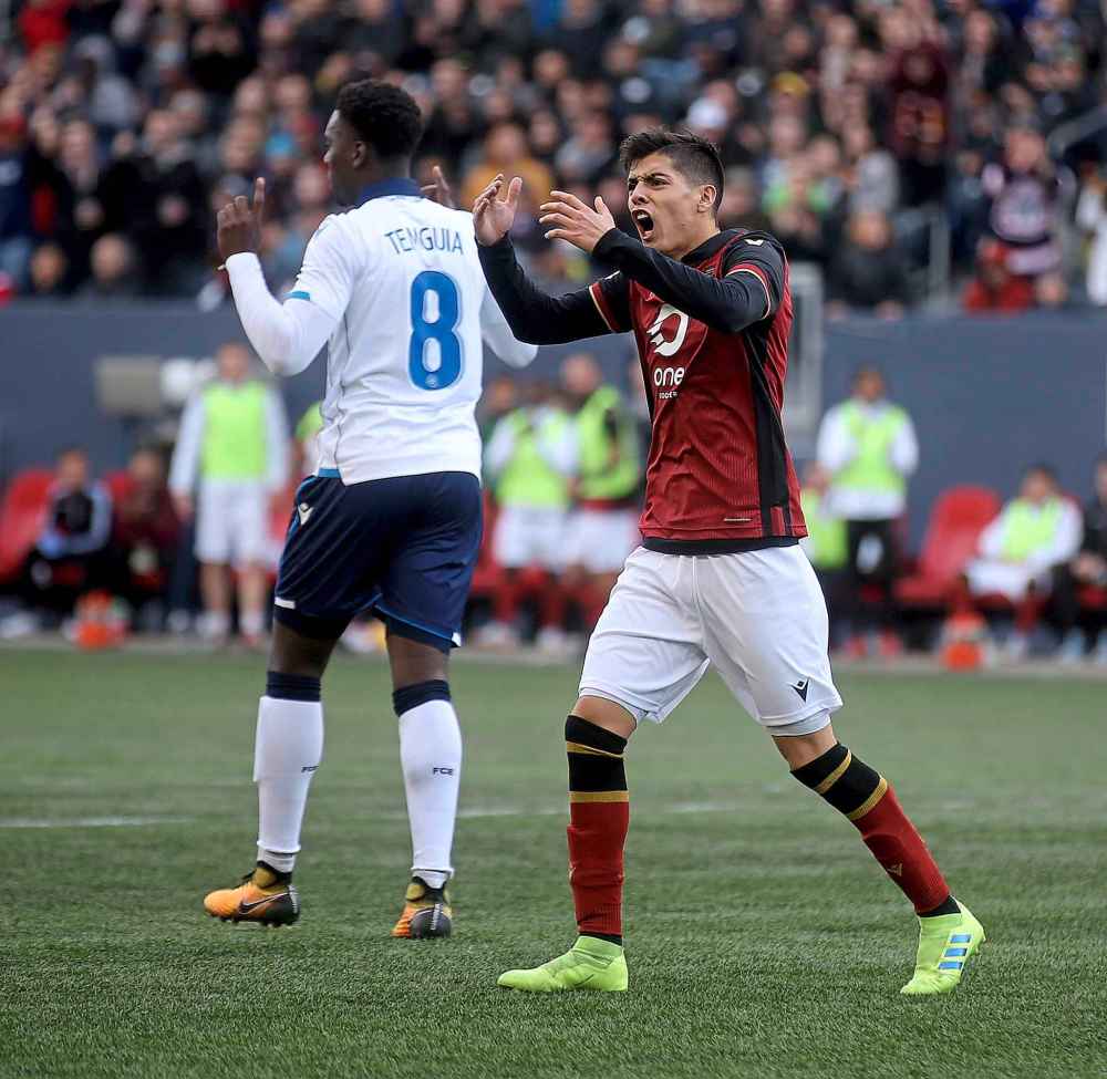 Valour FC's Diego Gutierrez protests after being tripped in the box, leading to a penalty kick versus FC Edmonton.