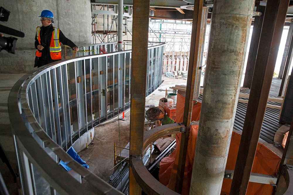 The entry atrium is dominated by the serpentine steel frame of the three-storey visible vault, where the gallery's archived collection of Inuit art will be visible to all who enter