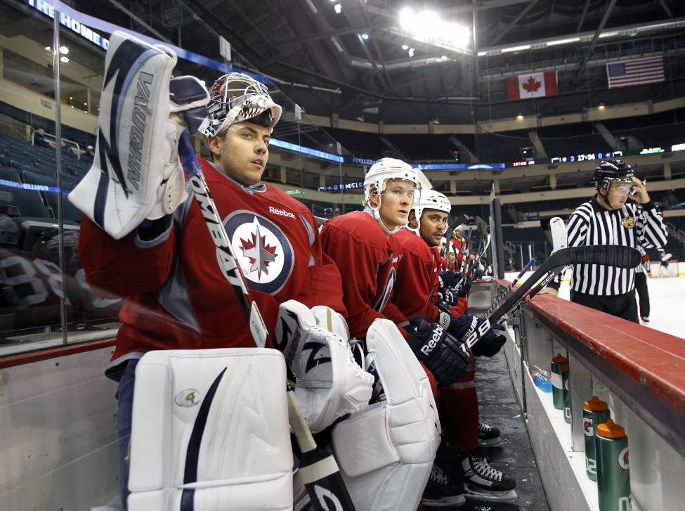WAYNE GLOWACKI/WINNIPEG FREE PRESS
Goaltender Ondrej Pavelec takes his turn on the bench at the MTS Centre.