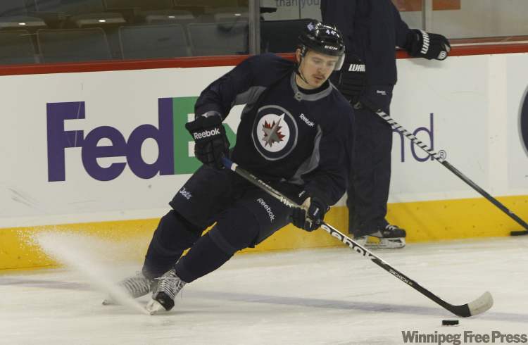 (WAYNE GLOWACKI / WINNIPEG FREE PRESS)
Defencemen Arturs Kulda at the Winnipeg Jets morning practice Monday. Kulda he was recalled along with Forward Jason Jaffray from the St. John's IceCaps.