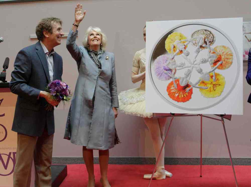 Wayne Glowacki / Winnipeg Free Press
Camilla, Duchess of Cornwall with RWB Artistic Director Andre Lewis during Canada's Royal Winnipeg Ballet building visit. At right is the new silver collector coin to commemorate the 75th anniversary of Canada's Royal Winnipeg Ballet.