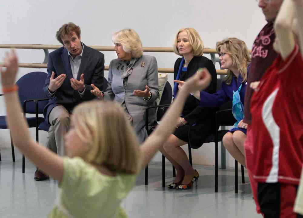 Wayne Glowacki / Winnipeg Free Press
From left, Royal Winnipeg Ballet Artistic Director Andre Lewis, Camilla, Duchess of Cornwall, Laureen Harper and Shelly Glover, MP watch an RWB outreach movement workshop with children from Art City during their tour of Canada's Royal Winnipeg Ballet building on Wednesday.