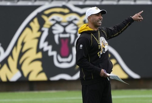 Hamilton Tiger-Cats head coach Orlondo Steinauer runs a drill during practice ahead of the 108th CFL Grey Cup against the Winnipeg Blue Bombers in in Hamilton, Ont., Saturday, Dec. 11, 2021. The Tiger-Cats have named Steniauer as the team's president of football operations. THE CANADIAN PRESS/Nathan Denette