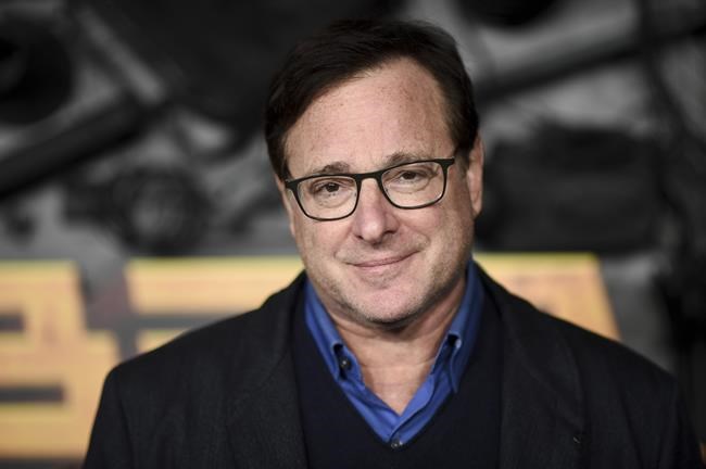 FILE - Bob Saget arrives at a screening of