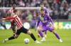 Tottenham Hotspur's Rodrigo Bentancur, right, in action during the English Premier League soccer match between Tottenham Hotspur and Brentford at the Brentford Community Stadium, London, Saturday April 23, 2022. (Adam Davy/PA via AP)
