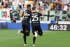 Spezia's Giulio Maggiore, right, celebrates scoring during the Serie A soccer match between Udinese and Spezia at Friuli Stadium, Udine, Italy, Sunday May 14, 2022. (Andrea Bressanutti/LaPresse via AP)