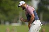 Jon Rahm, of Spain, celebrates after a putt on the 17th hole during the second round of the PGA Championship golf tournament at Southern Hills Country Club, Friday, May 20, 2022, in Tulsa, Okla. (AP Photo/Eric Gay)