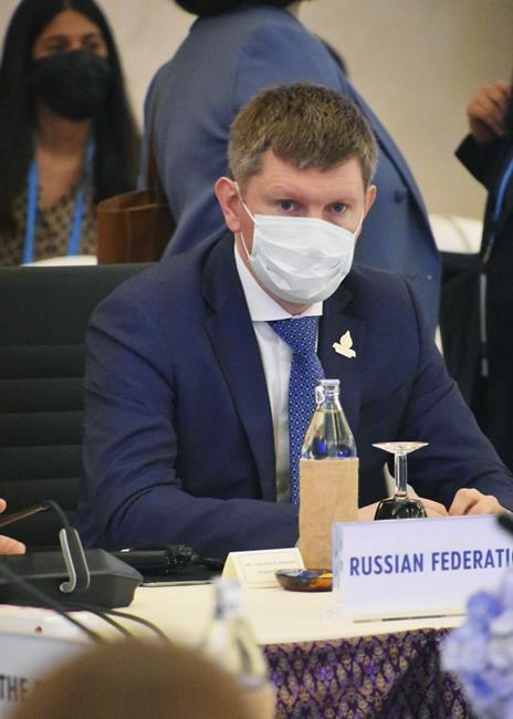 Russia’s Minister for Economic Development Maxim Reshetnikov attends a meeting of trade ministers of the Asia-Pacific Economic Cooperation group in Bangkok, Thailand Saturday, May 21, 2022. Delegates from the United States and four other nations staged a walkout Saturday when the representative from Russia began his opening remarks at the meeting, officials said. (Kyodo News via AP)