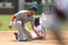 Chicago White Sox's Tim Anderson, right, steals second base as Chicago Cubs second baseman Andrelton Simmons, left, tries to apply a tag during the first inning of a baseball game at Guaranteed Rate Field, Sunday, May 29, 2022, in Chicago. (AP Photo/Paul Beaty)