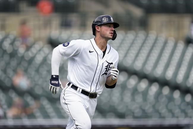 Detroit Tigers' Spencer Torkelson runs out a single against the Minnesota Twins in the ninth inning of the first game of a baseball doubleheader in Detroit, Tuesday, May 31, 2022. (AP Photo/Paul Sancya)