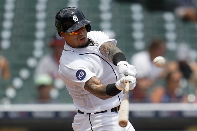 Detroit Tigers' Javier Baez hits a double against the Minnesota Twins in the fourth inning of the first game of a baseball doubleheader in Detroit, Tuesday, May 31, 2022. (AP Photo/Paul Sancya)