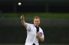 FILE - NBC Sports Premier League play-by-play broadcast announcer Arlo White throws out a ceremonial first pitch before a baseball game between the Chicago Cubs and the Seattle Mariners on Sept. 3, 2019, at Wrigley Field in Chicago. White will not return to NBC’s coverage of the Premier League when the season begins in August, a person with knowledge of the situation told The Associated Press. White will be replaced by Peter Drury, who has been calling the top Premier League games since 1998, recently on the league’s world feed.(AP Photo/Paul Beaty, File)