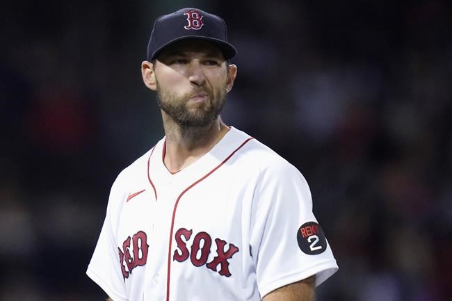 Boston Red Sox starting pitcher Michael Wacha heads to the dugout after being pulled during the sixth inning of the team's baseball game against the Cincinnati Reds, Tuesday, May 31, 2022, at Fenway Park in Boston. (AP Photo/Charles Krupa)