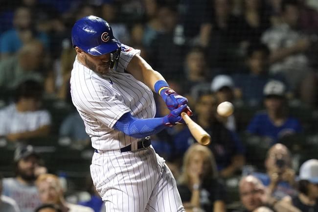 Chicago Cubs' Patrick Wisdom hits a home run off Milwaukee Brewers relief pitcher Brad Boxberger during the eighth inning of a baseball game Tuesday, May 31, 2022, in Chicago. (AP Photo/Charles Rex Arbogast)