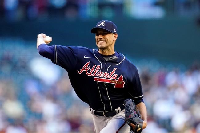 Atlanta Braves starting pitcher Charlie Morton throws a pitch against the Arizona Diamondbacks during the first inning of a baseball game Tuesday, May 31, 2022, in Phoenix. (AP Photo/Ross D. Franklin)
