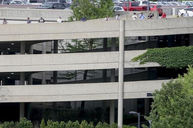 Tulsa police and firefighters respond to a shooting at the Natalie Medical Building Wednesday, June 1, 2022. in Tulsa, Okla. Multiple people were shot at a Tulsa medical building on a hospital campus Wednesday. (Ian Maule/Tulsa World via AP)