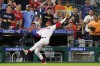 Philadelphia Phillies third baseman Johan Camargo catches a pop foul out by San Francisco Giants' Wilmer Flores during the eighth inning of a baseball game, Wednesday, June 1, 2022, in Philadelphia. (AP Photo/Matt Slocum)