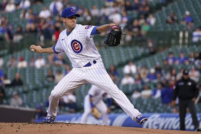 Chicago Cubs starting pitcher Kyle Hendricks delivers during the first inning of the team's baseball game against the Milwaukee Brewers on Wednesday, June 1, 2022, in Chicago. (AP Photo/Charles Rex Arbogast)