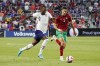 U.S. forward Haji Wright (19) vie for the ball against Morocco's Nayef Aguerd (5) during the second half of an international friendly soccer match, Wednesday, June 1, 2022, in Cincinnati. (AP Photo/Jeff Dean)