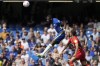 Chelsea's Antonio Rudiger jumps to head the ball during the English Premier League soccer match between Chelsea and Watford at Stamford Bridge stadium in London, Sunday, May 22, 2022.(AP Photo/Alastair Grant)