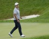 K.H. Lee, of South Korea, finishes on the 16th hole during the first round of the Memorial golf tournament in Dublin, Ohio, Thursday, June 2, 2022. (Barbara J. Perenic/The Columbus Dispatch via AP)