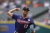Minnesota Twins starting pitcher Chris Archer throws during the first inning of a baseball game against the Detroit Tigers, Thursday, June 2, 2022, in Detroit. (AP Photo/Carlos Osorio)