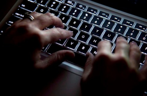A woman uses her computer keyboard in North Vancouver, B.C., on December 19, 2012. Remote work flourished during the pandemic as companies closed their offices, but it has created a schism among Canadian workers as the economy starts to reopen.THE CANADIAN PRESS/Jonathan Hayward