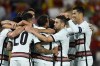 Portugal players celebrate after Portugal's Ricardo Horta scored their side's first goal during the UEFA Nations League soccer match between Spain and Portugal, at the Benito Villamarin Stadium, in Seville, Spain, Thursday, June 2, 2022. (AP Photo/Jose Breton)