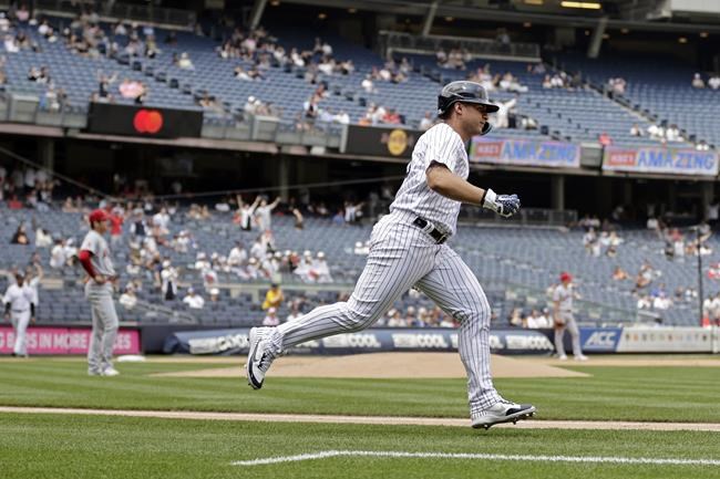 New York Yankees' Gleyber Torres rounds first base after hitting a home run off of Los Angeles Angels pitcher Shohei Ohtani during the first inning of the first baseball game of a doubleheader on Thursday, June 2, 2022, in New York. (AP Photo/Adam Hunger)