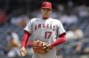 Los Angeles Angels pitcher Shohei Ohtani reacts during the third inning of the first baseball game of a doubleheader against the New York Yankees on Thursday, June 2, 2022, in New York. (AP Photo/Adam Hunger)