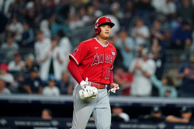 Los Angeles Angels' Shohei Ohtani reacts after being thrown out at first base during the seventh inning in the second baseball game of the team's doubleheader against the New York Yankees on Thursday, June 2, 2022, in New York. (AP Photo/Frank Franklin II)
