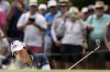 Danielle Kang hits out of the bunker on the 18th hole during the second round of the U.S. Women's Open golf tournament at the Pine Needles Lodge & Golf Club in Southern Pines, N.C. on Friday, June 3, 2022. (AP Photo/Chris Carlson)