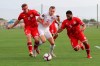 Canada's Alistair Johnston (2) splits the defense of Cayman Islands defenders Mason Duval (11) and Wesley Robinson during the first half of a World Cup 2022 Group B qualifying soccer match Monday, March 29, 2021, in Bradenton, Fla. THE CANADIAN PRESS/AP-Mike Carlson