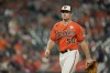 Baltimore Orioles starting pitcher Bruce Zimmermann heads to the dugout after being pulled for a reliever during the sixth inning of a baseball game against the Cleveland Guardians, Friday, June 3, 2022, in Baltimore. (AP Photo/Julio Cortez)
