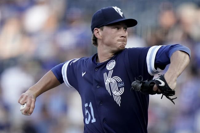 Kansas City Royals starting pitcher Brady Singer throws during the first inning of a baseball game against the Houston Astros Friday, June 3, 2022, in Kansas City, Mo. (AP Photo/Charlie Riedel)