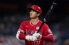 Los Angeles Angels' Shohei Ohtani prepares to bat during the eighth inning of a baseball game against the Philadelphia Phillies, Friday, June 3, 2022, in Philadelphia. (AP Photo/Matt Slocum)