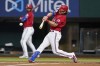 Texas Rangers' Josh Smith connects for a single in the first inning of a baseball game against the Seattle Mariners, Friday, June 3, 2022, in Arlington, Texas. (AP Photo/Tony Gutierrez)